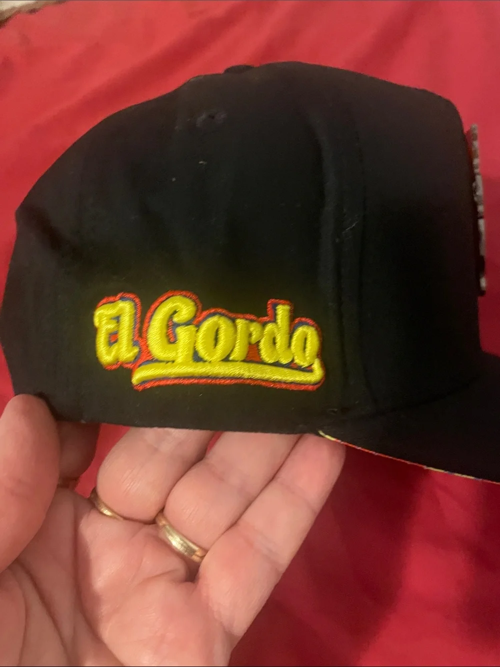 Black Trucker Hat with Gordo Metal Patch